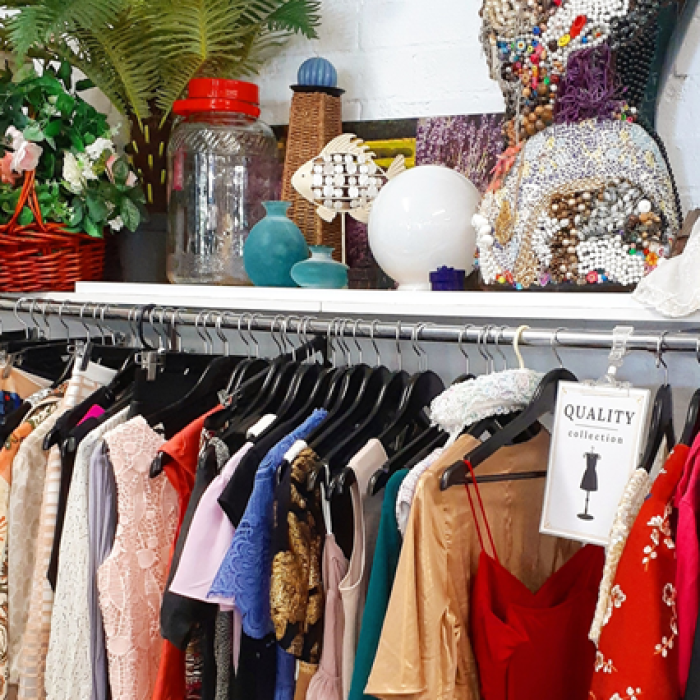 rack of colourful clothing and items on a shelf