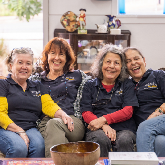 group of volunteers smiling and laughing