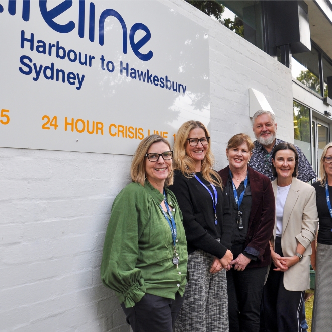 Team smiling outside Gordon office