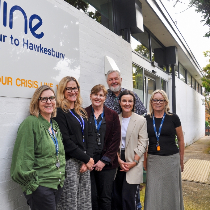 Team smiling outside Gordon office