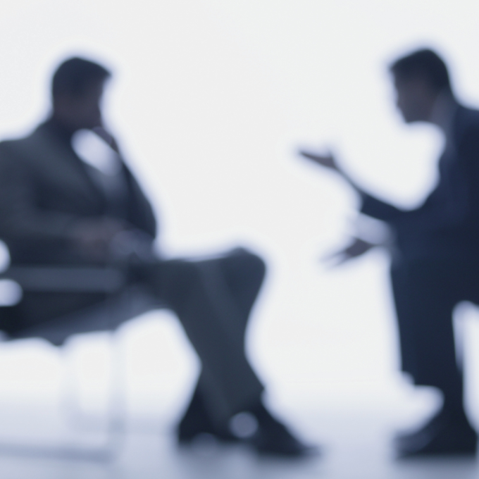 Two men having a difficult conversation